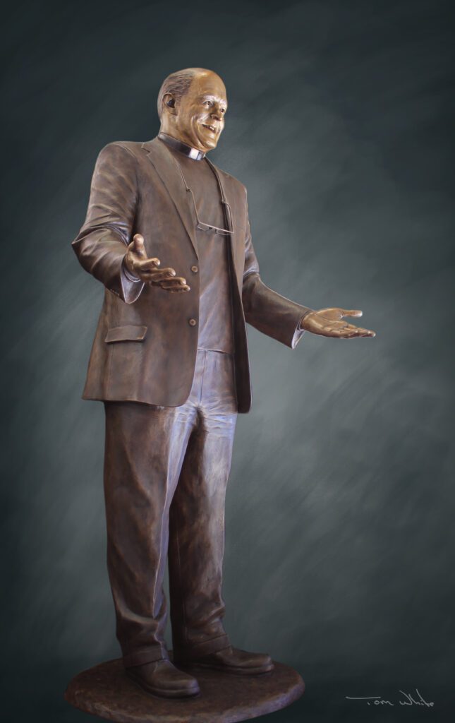 Bronze statue with open arms and smile