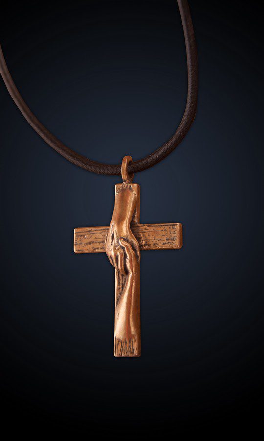 Tom White Studios, Inc | Cross Sculptures Calvary Jesus Rescued Statue Rescued Cross bronze necklace of sculpture created by Christian sculptor, Tom White. Depicts Jesus nail-scarred hand rescuing mankind by His great love shown on Calvary by His death and the power of His Resurrection. Available in necklaces and wall hangings.