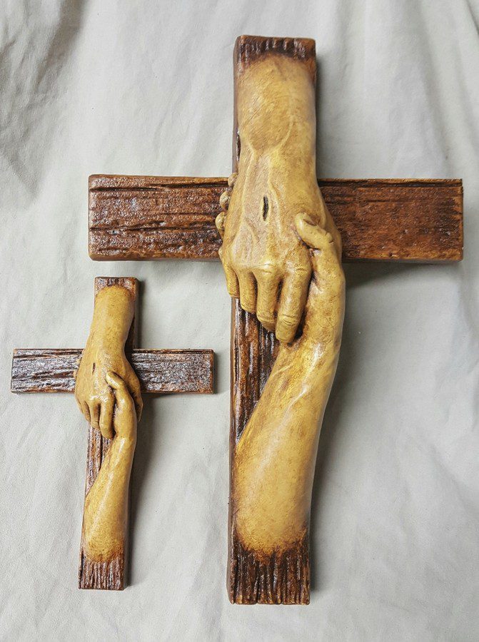 Tom White Studios, Inc | Cross Sculptures Calvary Jesus Rescued Statue Two rescued cross wall hangings displayed