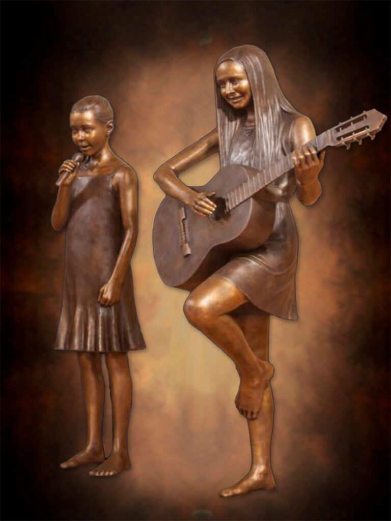 Bronze girl singing beside guitar player