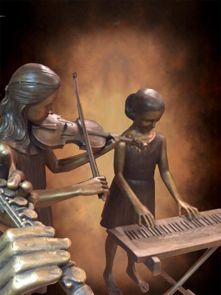 Violinist and pianist bronze girls closeup