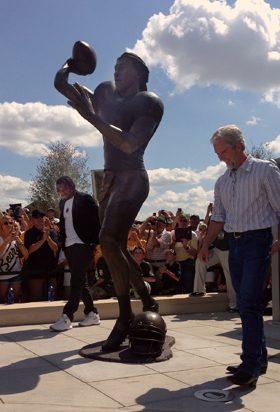 Bronze Heisman football statue unveiled at stadium