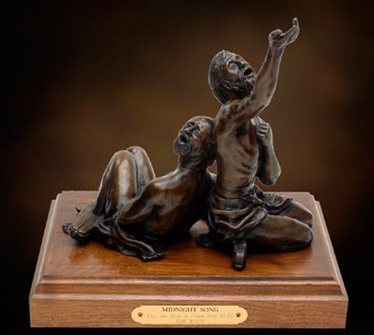Two apostles in worship bronze statuette