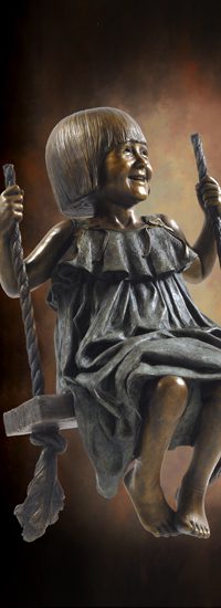 Tom White Studios, Inc | Children & Adults Figurative Bronze Statues Detailed bronze child on swing artwork