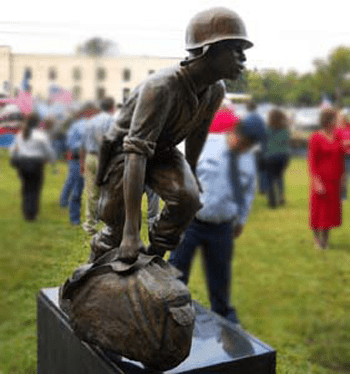 Medal of Honor Clarence Sasser Statue, Brazoria County Ring of Honor Veterans War Memorial, Angelton, TX created by commissioned bronze sculptor, Tom White who specializes in realistic portrait statues for military and veterans memorials.g.