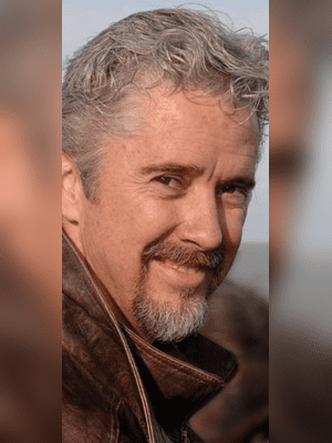 Smiling middle-aged man with gray hair