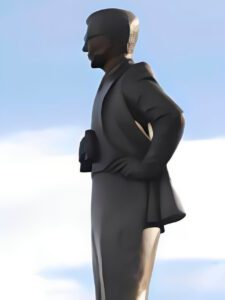 Bronze sculpted man in profile against sky