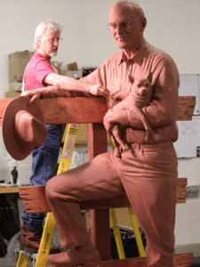 Bo Rubenstein Statue - portrait sculpture of owner of Texas Pipe for his Frebo Ranch in Columbus, Texas. Figurative memorial bronze sculptures by master Texas / Arizona commission sculptor, Tom White, monumental sculptures