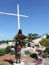 Tom White Studios, Inc | Jesus Statues Bronze Jesus statue with child near white cross