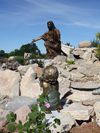 Tom White Studios, Inc | Jesus Statues Small child bronze statue reaching toward Jesus